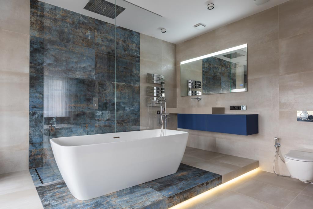 Modern raised bath blue beige tiles bathroom